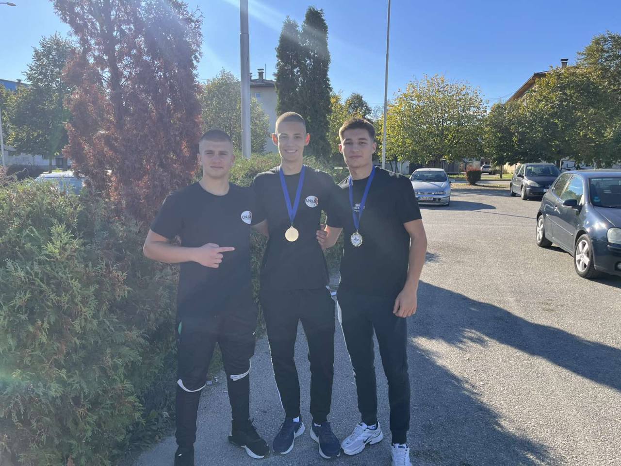 Dženan Ljeljak, Džemal Tulumović i Ilhan Mujanović sa medaljama
